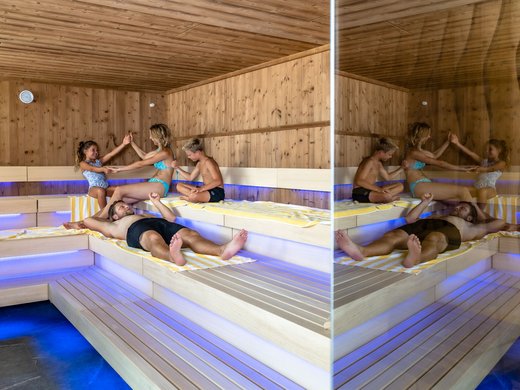 Familie entspannt in moderner Sauna Eine Familie mit zwei Kindern genießen gemeinsam die Wärme in einer modernen Sauna mit Holzverkleidung und blauer LED-Beleuchtung, während sie sich unterhalten und entspannen.